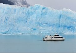 tourist boat at perito moreno glacier