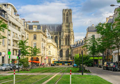 Tram on the streets and architecture of Reims