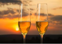 two champagne cup and sunset