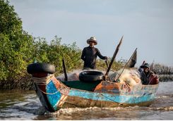 two fishermen on the fishing boat