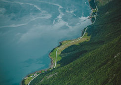 Curvy road by fjord in Norway