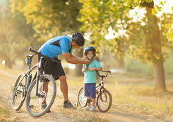 Father and son riding bicycles