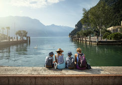 Family sitting enjoying view of lake Garda
