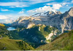 View to Marmolada and Fedaia lake in the Dolomites