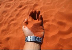 Red sand in hand