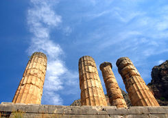 Low view of the remaining columns of a temple in Mycenae