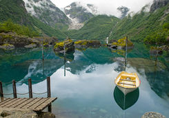 Fishing boat on mountain lake Norway