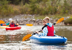 Young boy kayaking in British Columbia