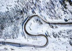snowy road from above