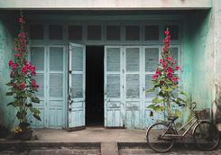 wooden house and bike in Hoi An