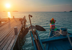 wooden fishing boat at sunset