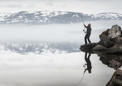 man fly fishing