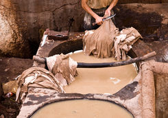 man working in a tannery