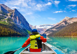 child canoeing lake louise
