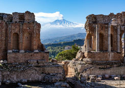 mount etna through ruins