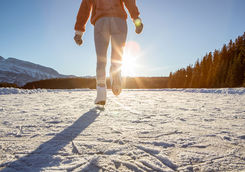 Ice skating on a frozen lake