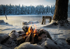 Making a fire outdoors in Swedish Lapland