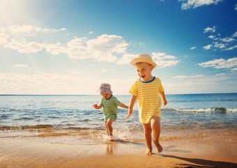 Toddlers on the beach in Cyprus