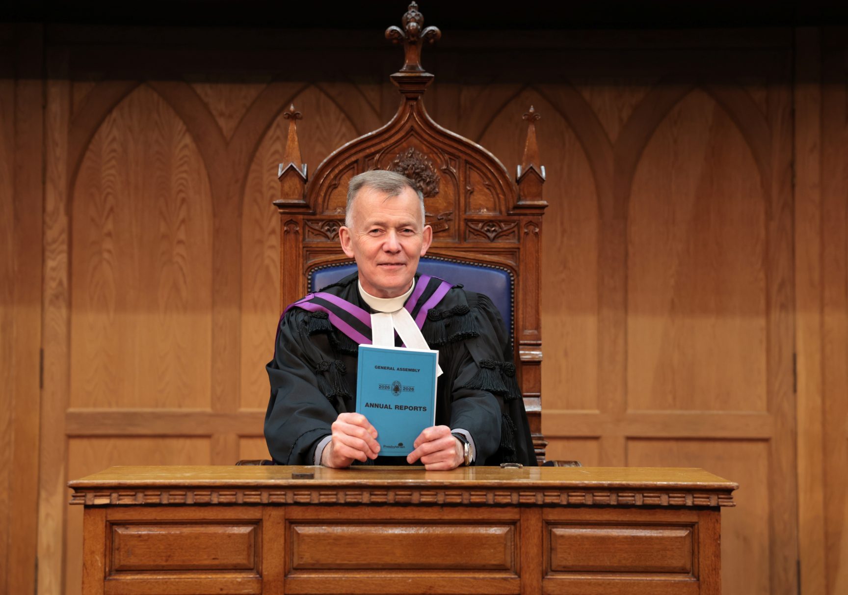 Moderator Rt Rev Dr Richard Murray with the Blue Book Credit Press Eye
