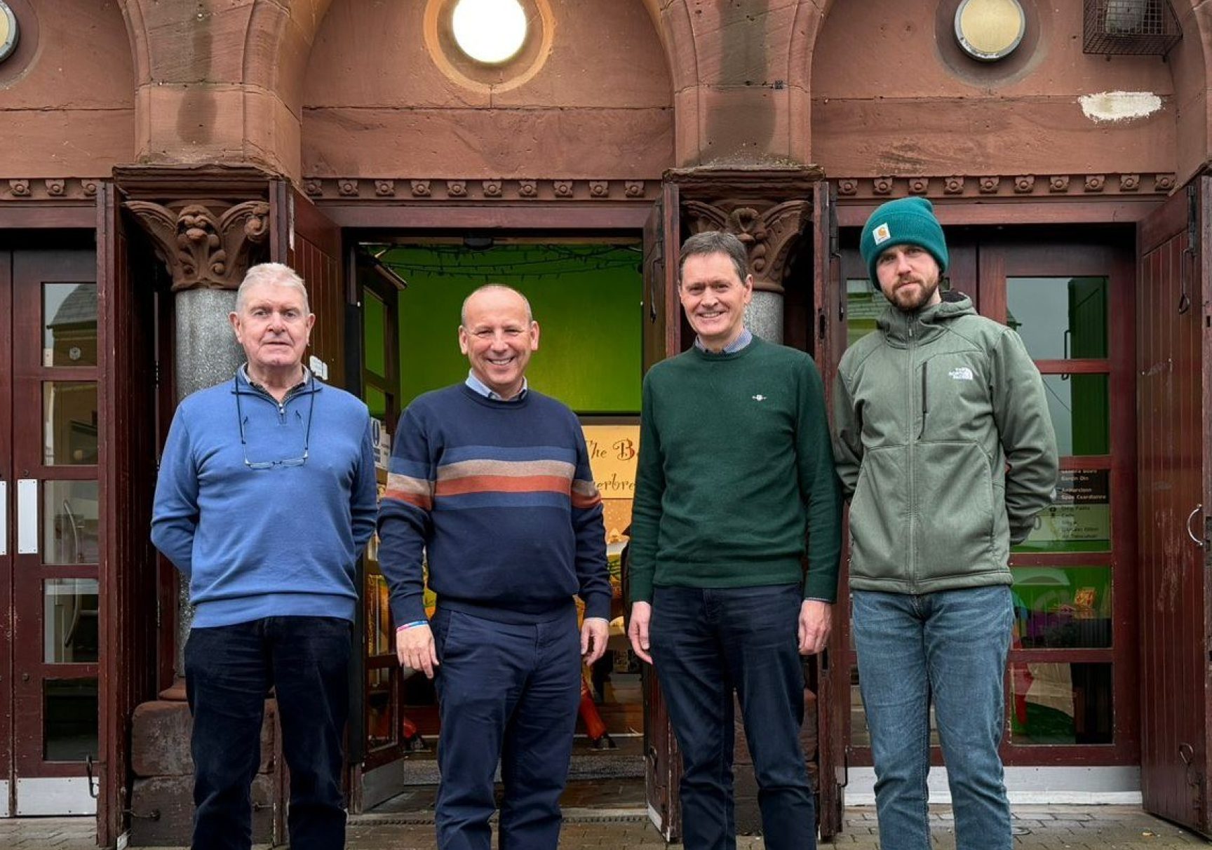 Rev David Moore and Rev Moore Casement outside Cultúrlann Mc Adam Ó Fiaich