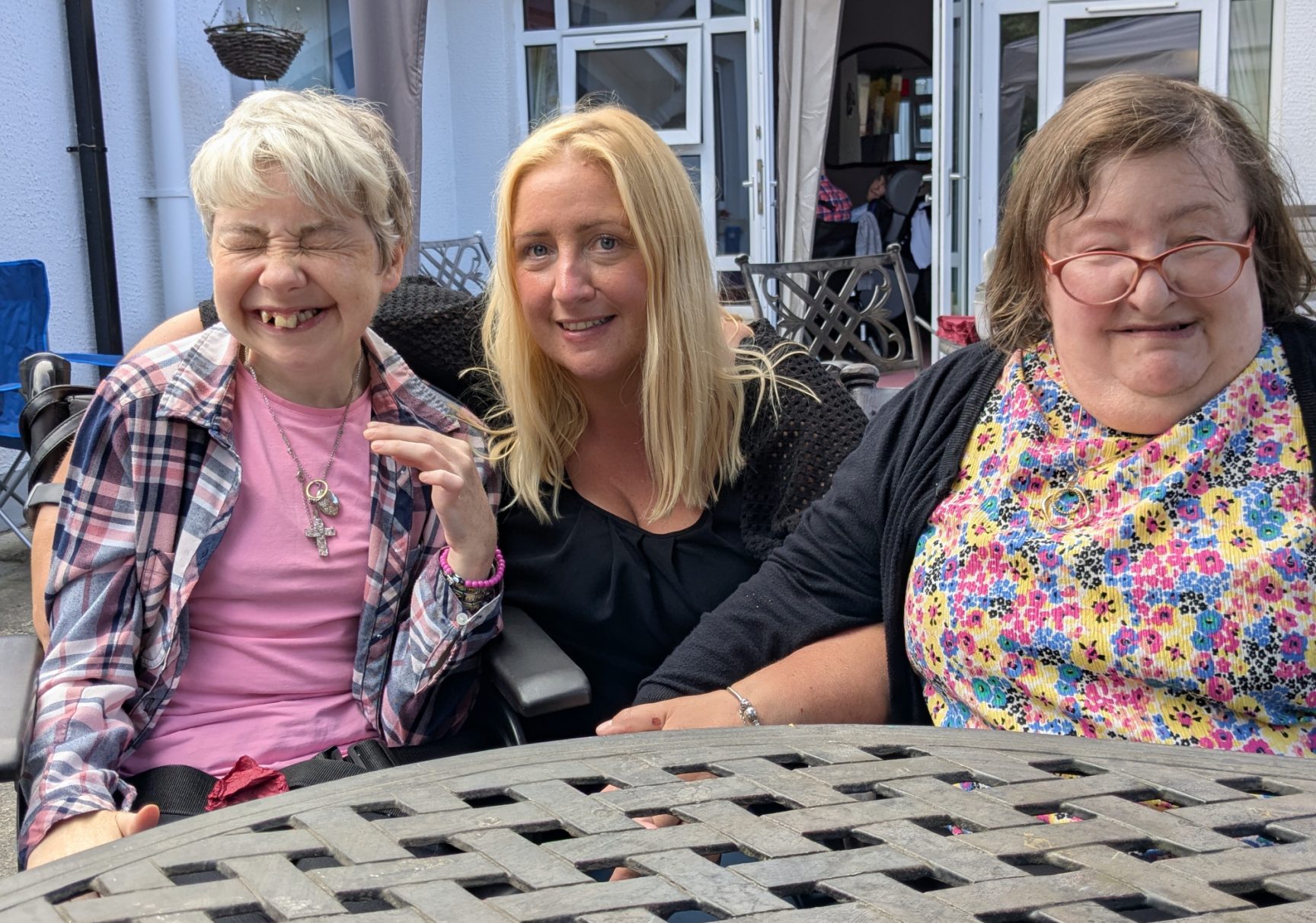 AH 30 4 Aaron House Manager Kelly Wilson and residents L Judith Gallagher R Elizabeth Brownlee