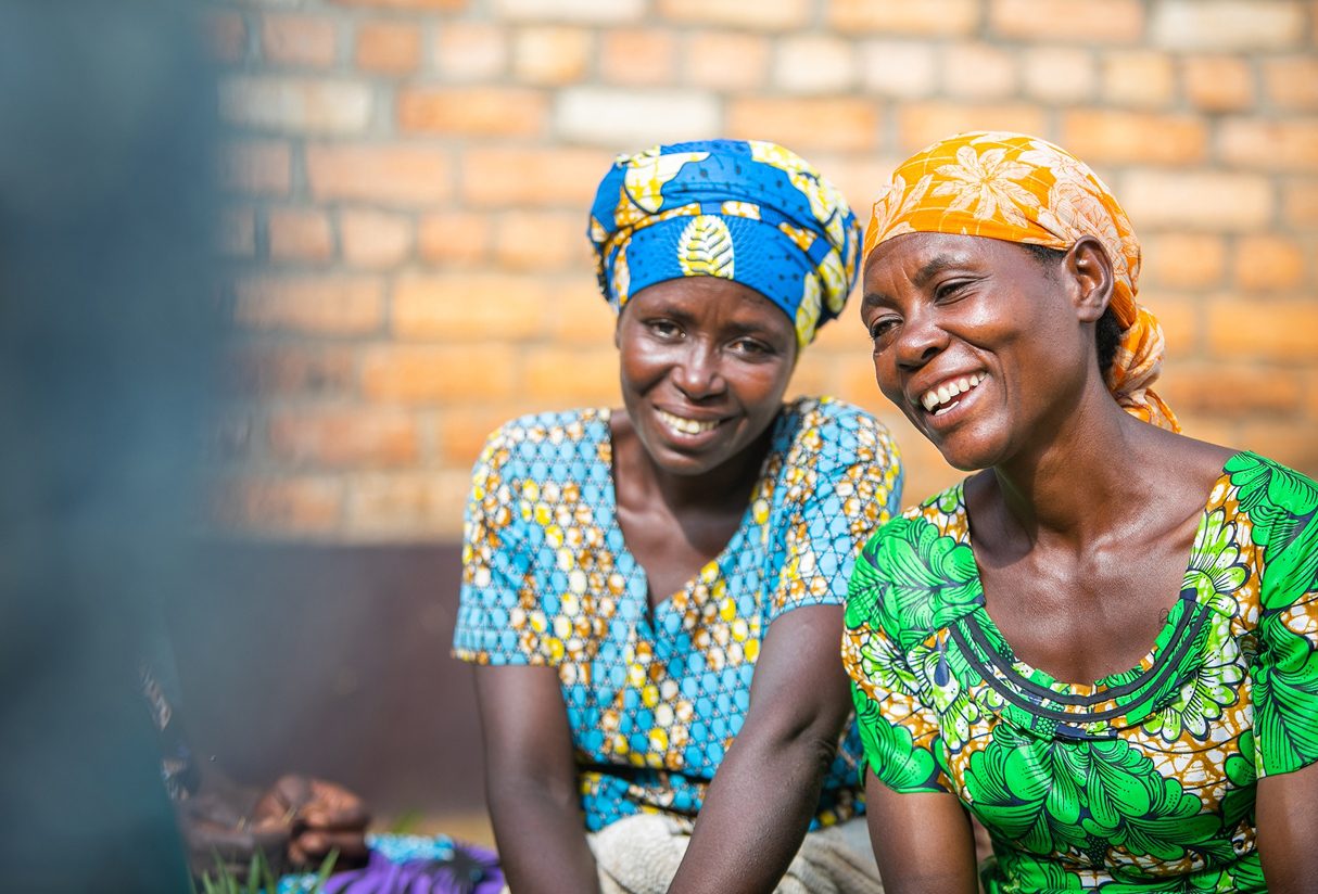 Two women smiling and laughing together