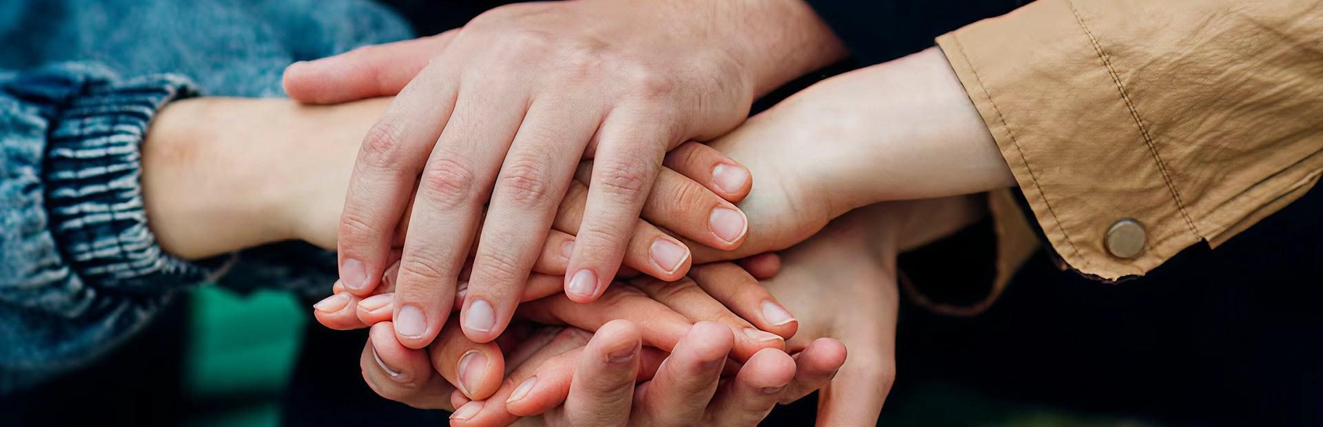Handholding people
