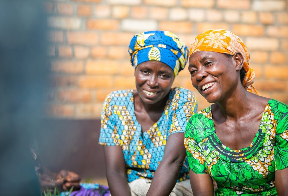 Two women smiling and laughing together