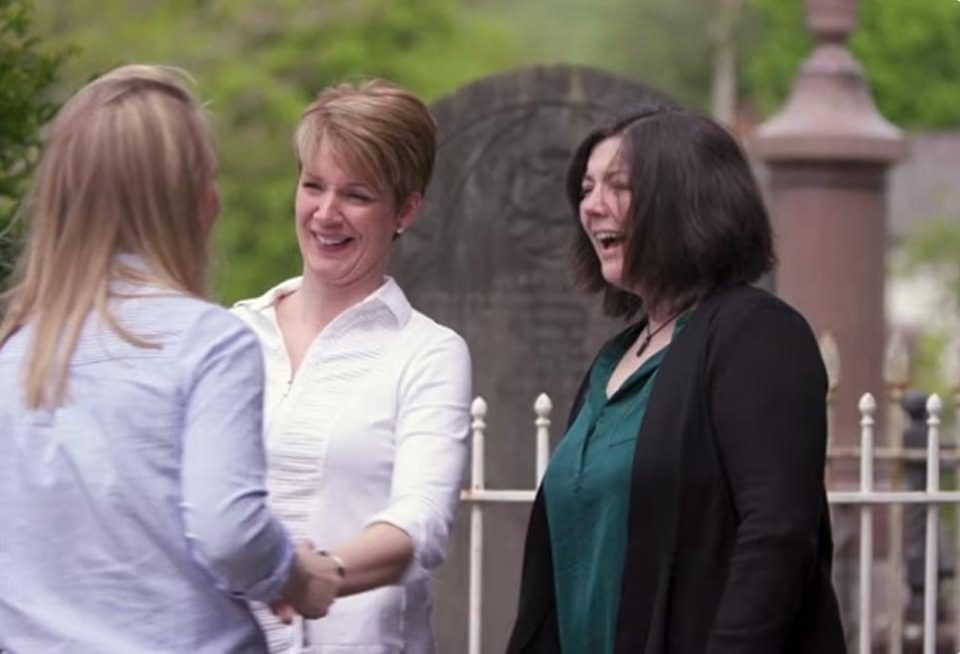 People greeting each other outside church