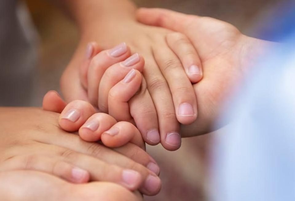 People holding hands together