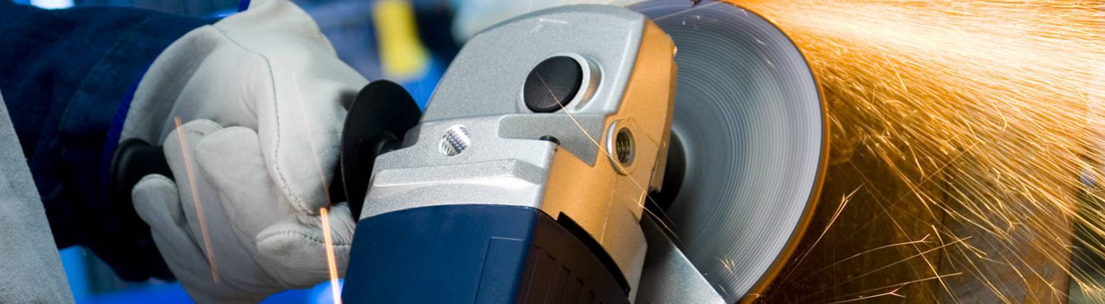 Man with grinder - abrasive wheels training from Project Skills Solutions