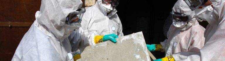 Asbestos Awareness training nationwide from project skills solutions, men in protection moving asbestos