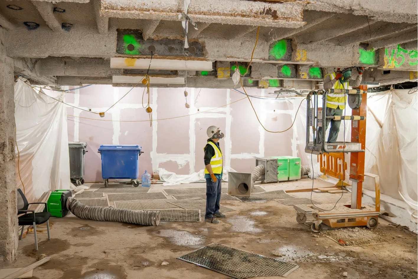 Dust extraction taking place during concrete cutting