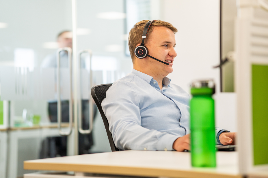 Consultant on the phone at his desk