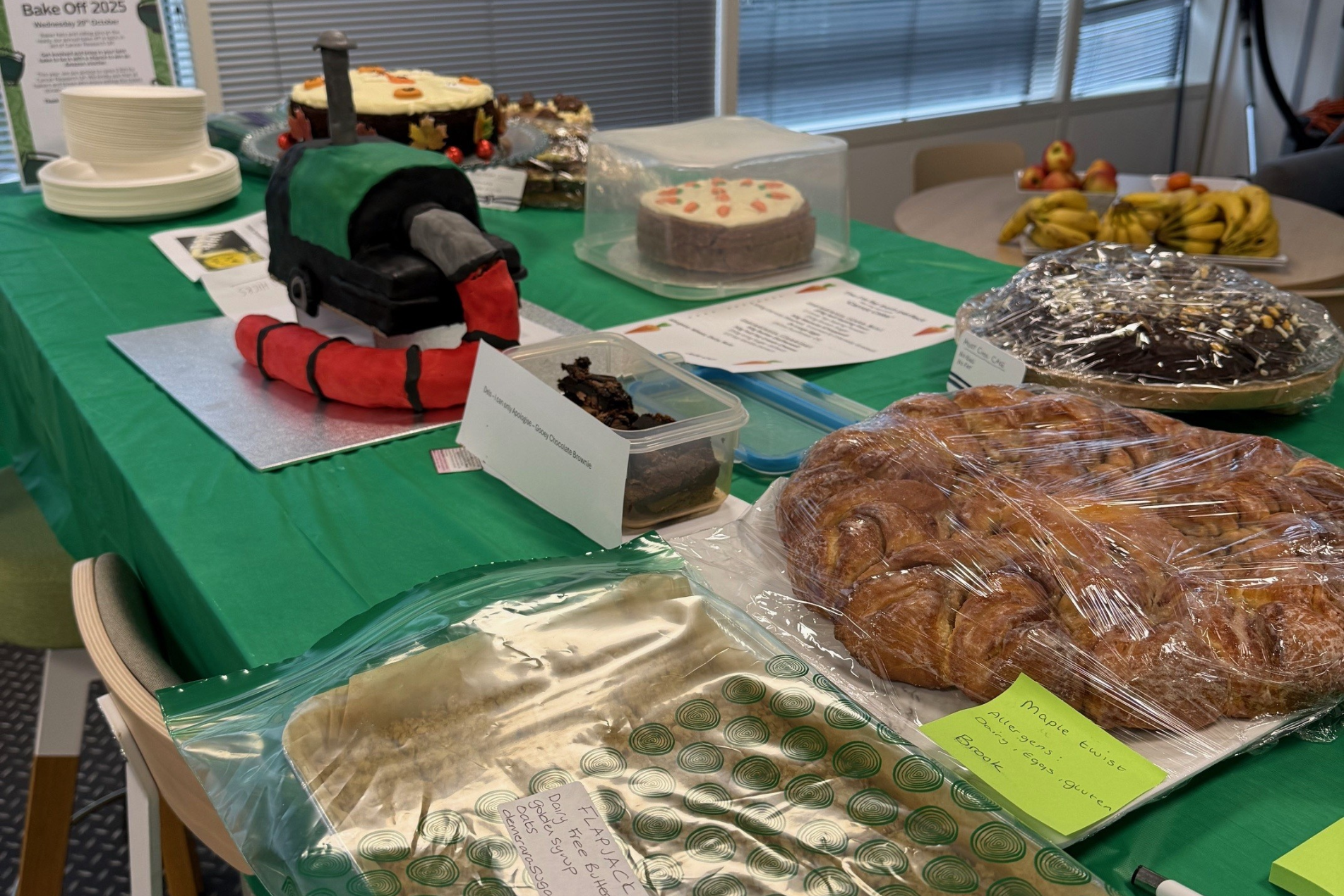 Riverbridge office cakes displayed on a table.