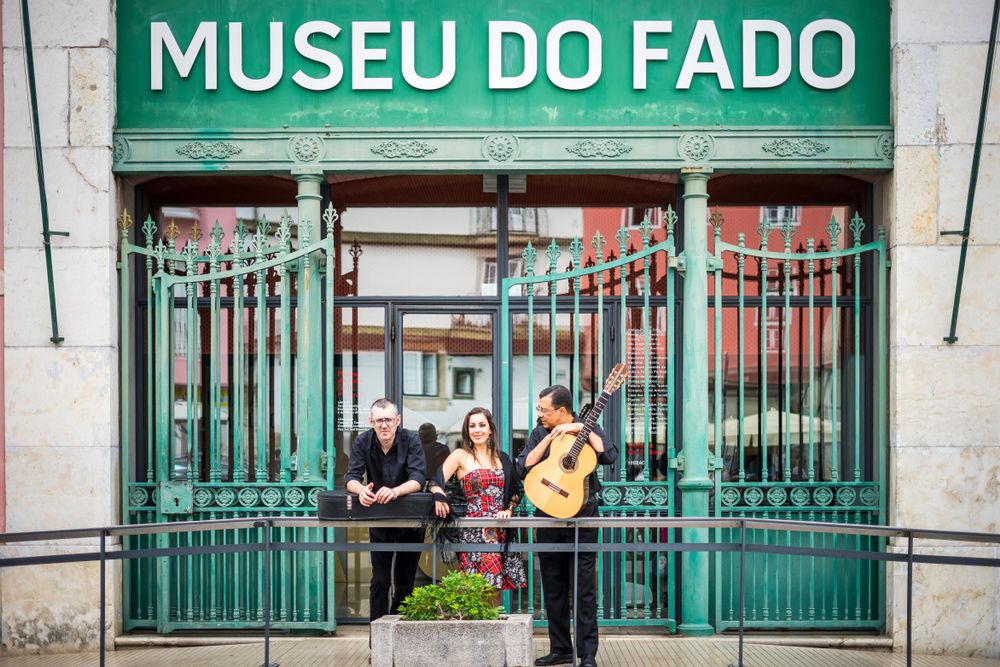 Portuguese,Guitar,Player,,Fado,Singer,And,Acoustic,Guitar,Player,In