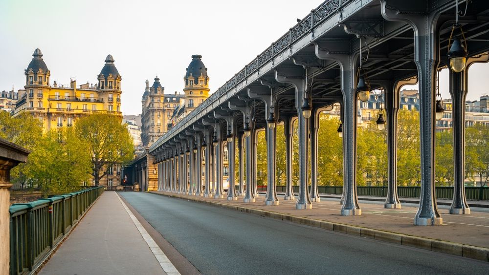 Promenade,Jean paul,Belmondo.,Long,Row,Of,Metal,Columns,Of,Elevated