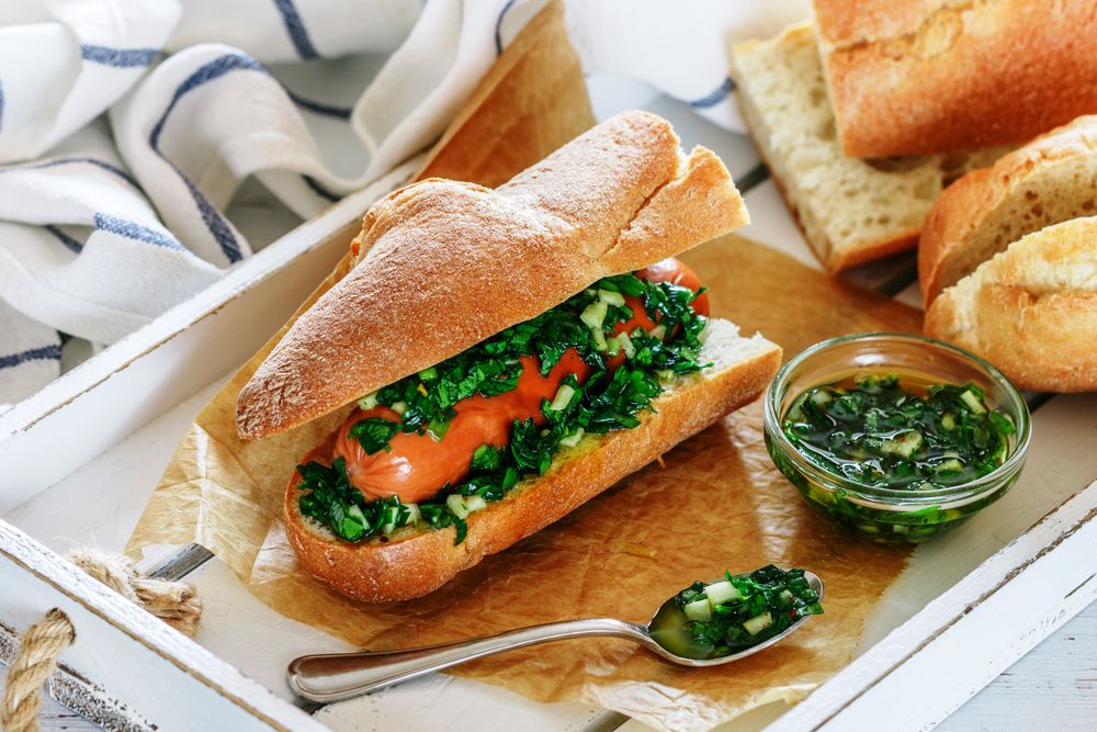 Homemade,Delicious,Baguette,Sandwich,With,Sausage,And,Chimichurri,Argentinian,Green