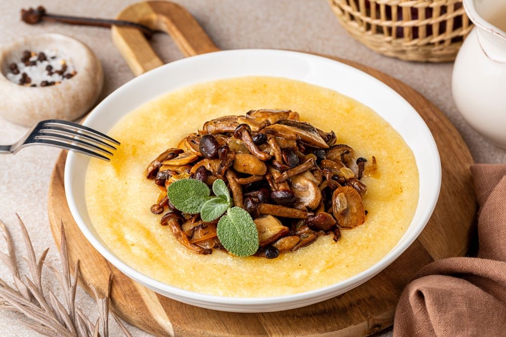 Italian,Polenta,With,Mix,Of,Mushrooms,,Champignon,,Porcini,,Pioppini,,Fried