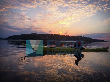 Padling i solnedgang