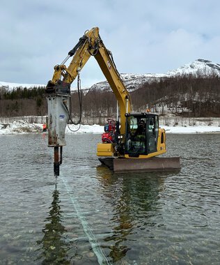 Montering av pukkellaksfelle