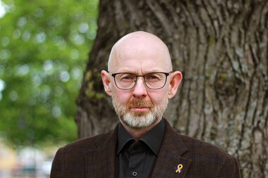 Pressefoto av fylkeslege Sigmund Skei