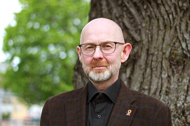 Pressefoto av fylkeslege Sigmund Skei