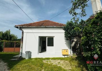 Reality Na predaj 4-izbový rodinný dom s pozemkom 567 m² – Veľké Uherce
