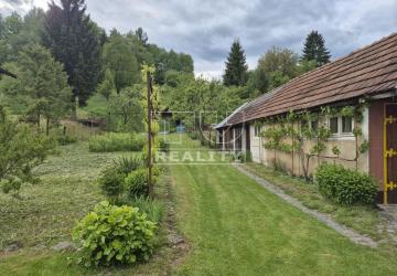 Reality Starší dom s ovocným sadom 1920m2 v Kľačne