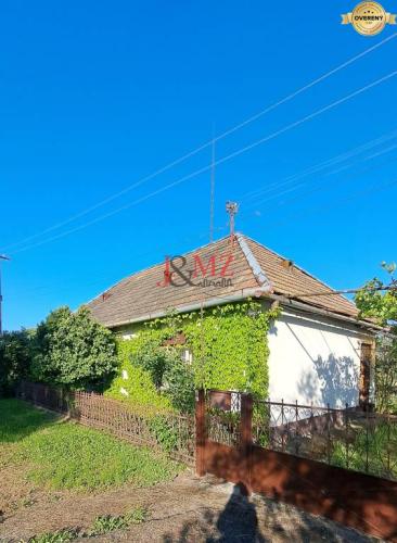 Reality DOHODA Rodinný dom, záhrada 1.400 m2, šírka 27m, Starý Hrádok SM - 833
