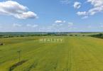 Reality Veľký rovinatý pozemok v Uníne – 4877 m² priestoru pre váš sen!