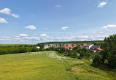 Reality Veľký rovinatý pozemok v Uníne – 4877 m² priestoru pre váš sen!