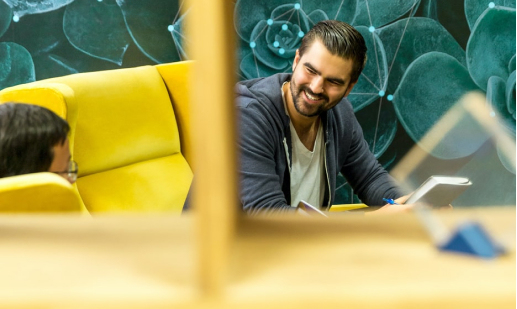 Two people meeting in a modern office