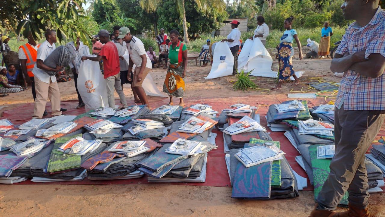 CARE distribution of NFI kits, including blankets, tarps, mosquito nets, mats and lamps, Morrumbene, Inhambane